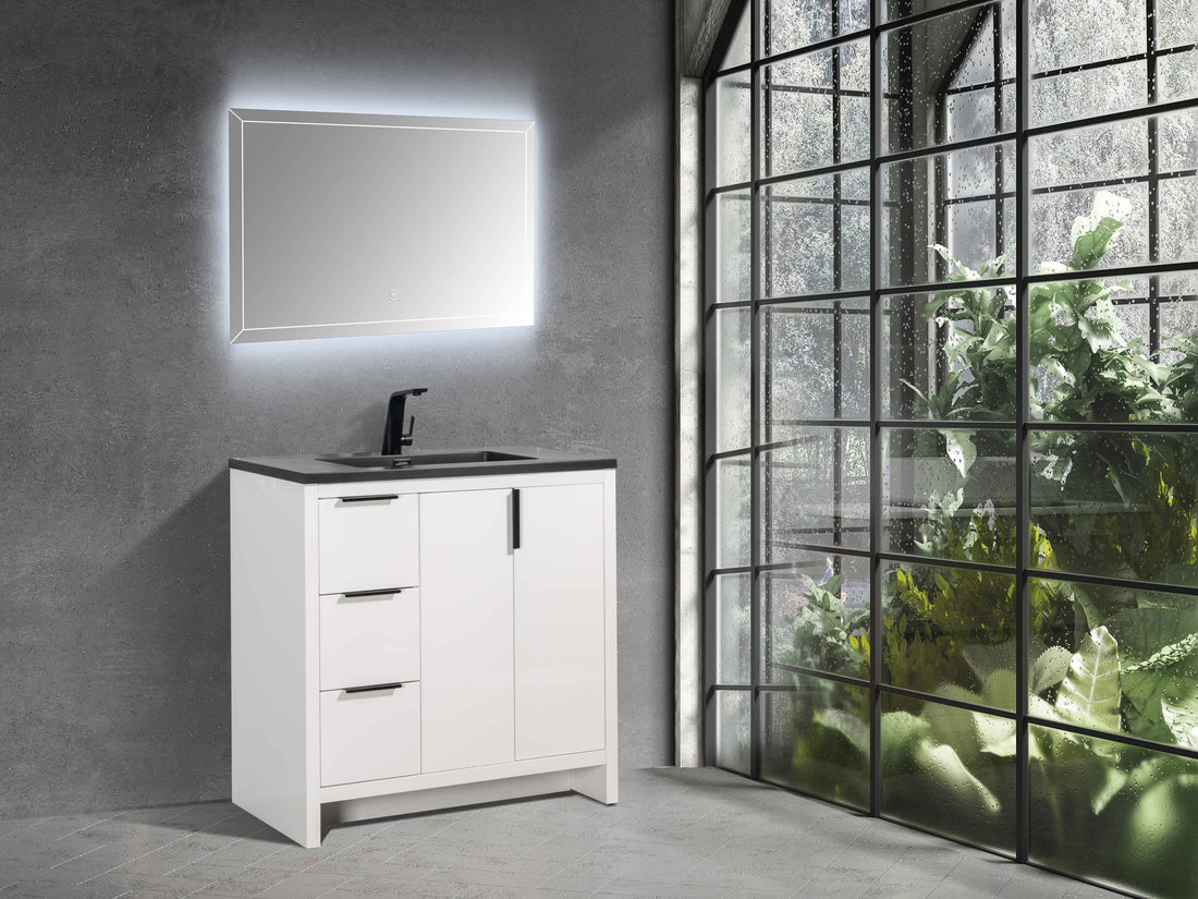 TONA Evana 36-inch white freestanding bathroom vanity with a matte black integrated sink and black faucet in a modern bathroom.