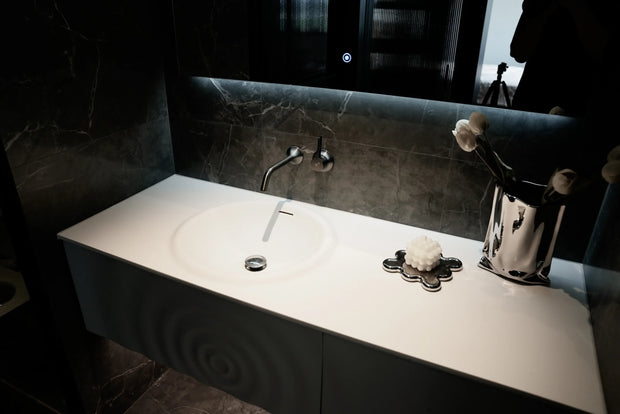 TONA Wave wall-mounted bathroom vanity features a unique ripple-like drawer front.