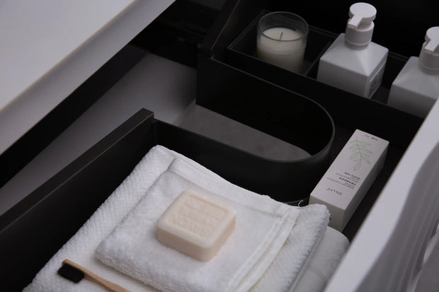 TONA Wave wall-mounted bathroom vanity features a unique ripple-like drawer front.