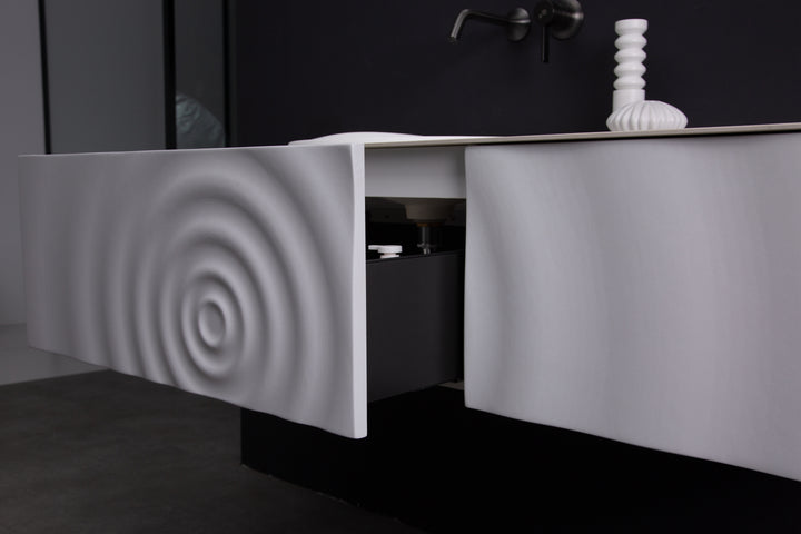 TONA Wave wall-mounted bathroom vanity features a unique ripple-like drawer front.