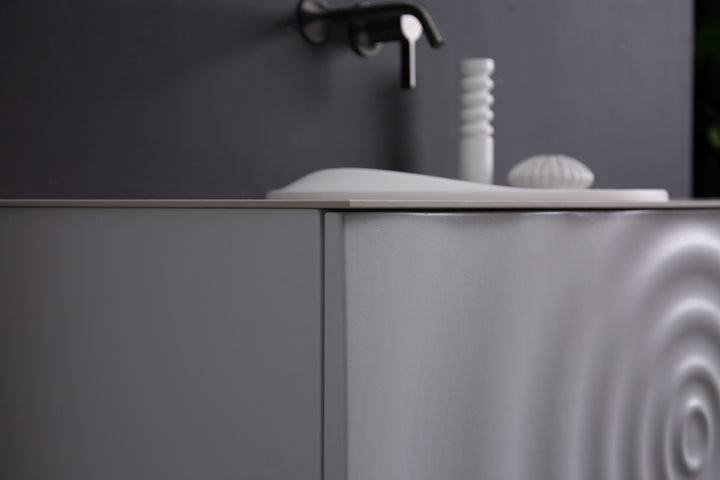 TONA Wave wall-mounted bathroom vanity features a unique ripple-like drawer front.